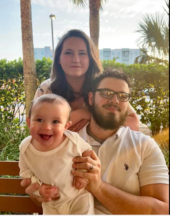 sidney james at beach with mom and dad 2024